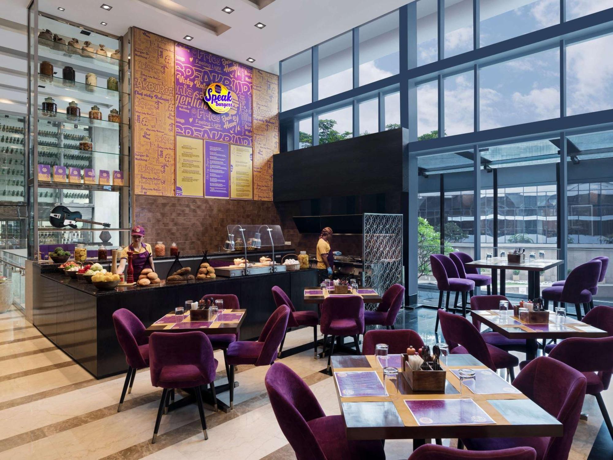 Novotel Kolkata Hotel And Residences Kültér fotó The interior of the restaurant